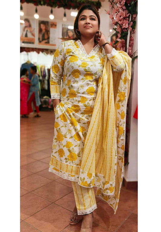 A full suit set comprising a V-neck lace embroidered kurta with a yellow-green floral print, paired with matching pants and a cotton floral dupatta- 04277